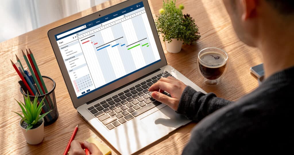 Landscaper Working With Project Management Software